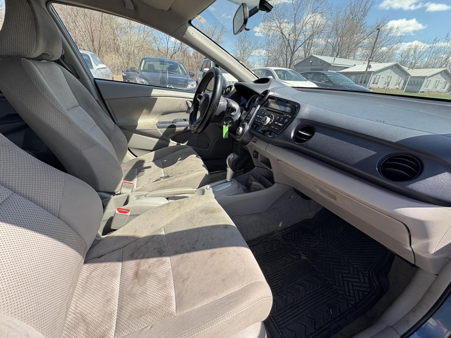 2010 Blue Honda Insight LX (JHMZE2H58AS) with an 1.3L L4 SOHC 8V HYBRID engine, Continuously Variable Transmisson transmission, located at 17255 hwy 65 NE, Ham Lake, MN, 55304, 0.000000, 0.000000 - Photo#15