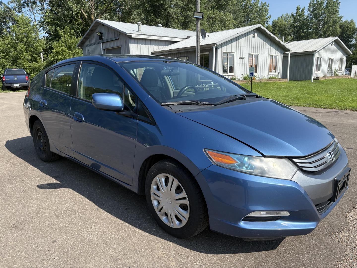 2010 Blue Honda Insight LX (JHMZE2H58AS) with an 1.3L L4 SOHC 8V HYBRID engine, Continuously Variable Transmisson transmission, located at 17255 hwy 65 NE, Ham Lake, MN, 55304, 0.000000, 0.000000 - Photo#6