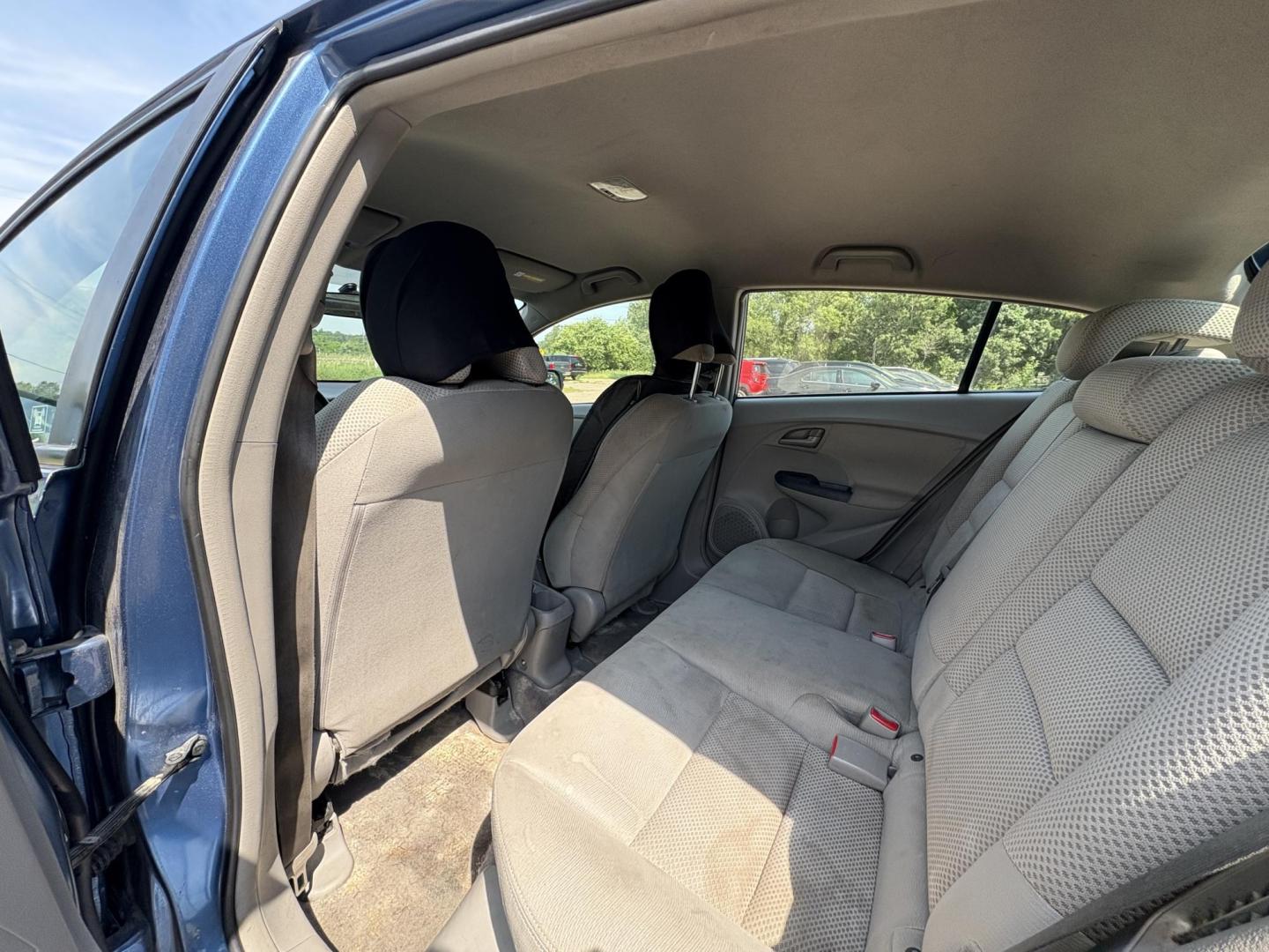 2010 Blue Honda Insight LX (JHMZE2H58AS) with an 1.3L L4 SOHC 8V HYBRID engine, Continuously Variable Transmisson transmission, located at 17255 hwy 65 NE, Ham Lake, MN, 55304, 0.000000, 0.000000 - Photo#11