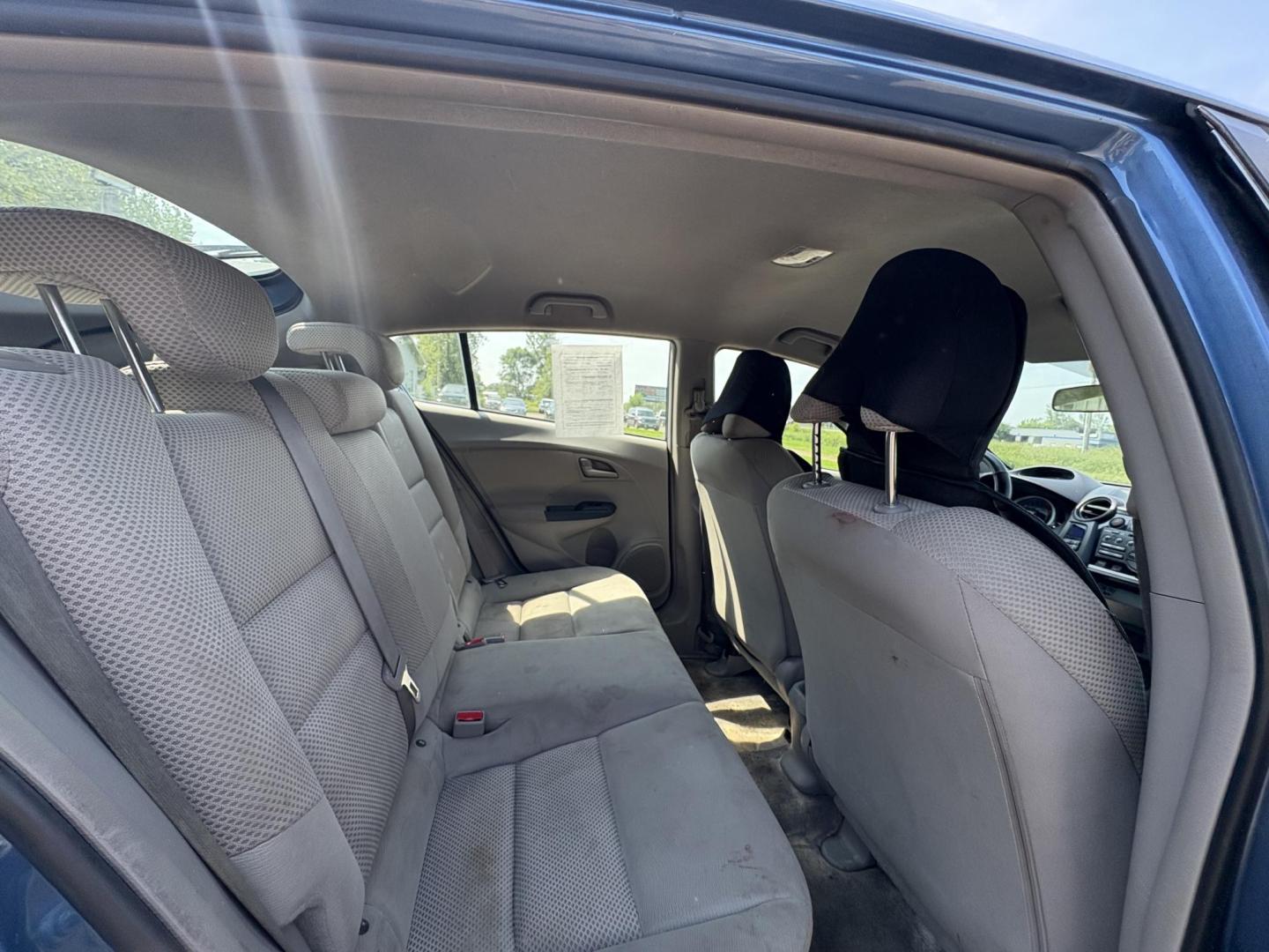 2010 Blue Honda Insight LX (JHMZE2H58AS) with an 1.3L L4 SOHC 8V HYBRID engine, Continuously Variable Transmisson transmission, located at 17255 hwy 65 NE, Ham Lake, MN, 55304, 0.000000, 0.000000 - Photo#13