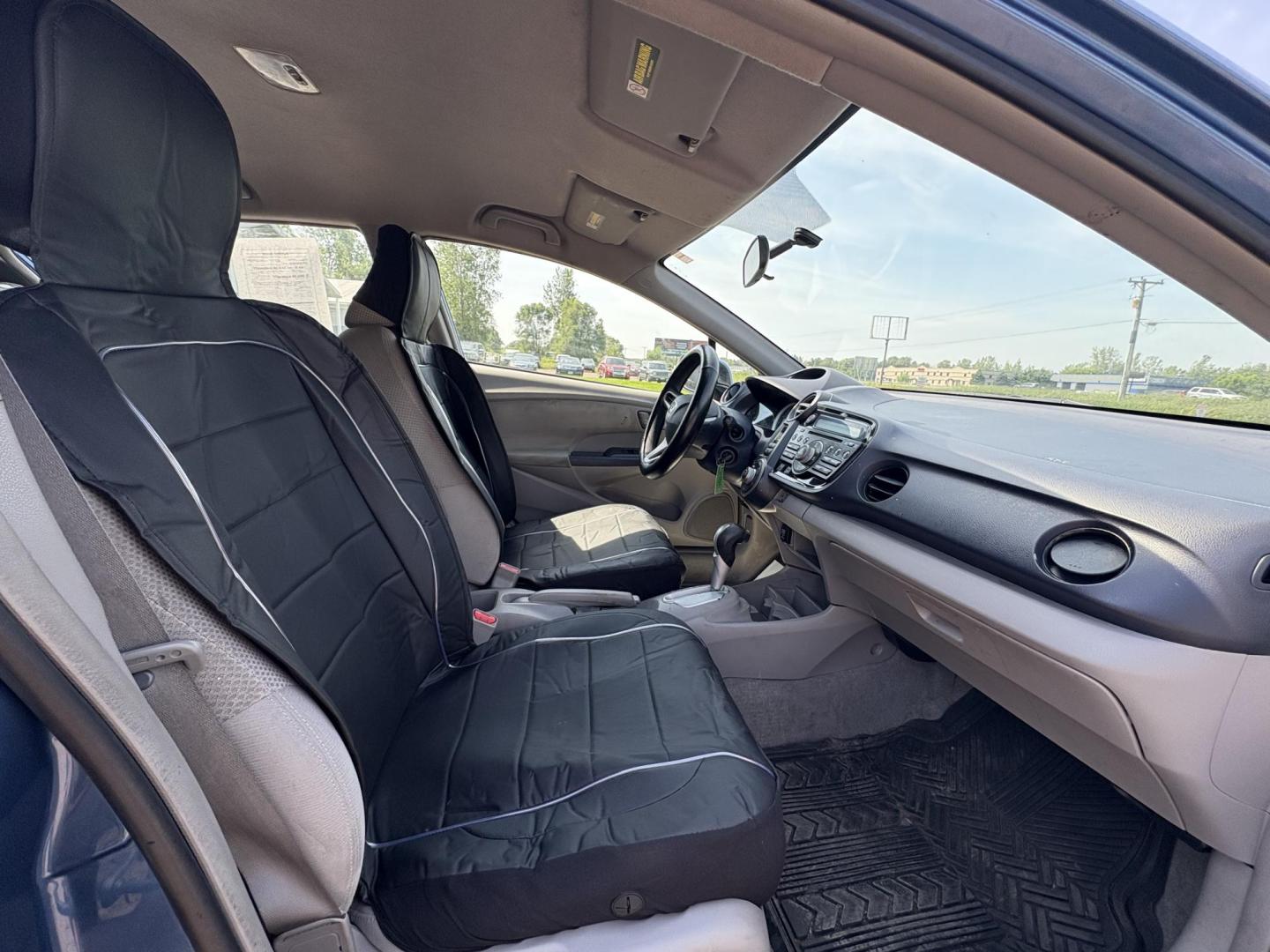 2010 Blue Honda Insight LX (JHMZE2H58AS) with an 1.3L L4 SOHC 8V HYBRID engine, Continuously Variable Transmisson transmission, located at 17255 hwy 65 NE, Ham Lake, MN, 55304, 0.000000, 0.000000 - Photo#15