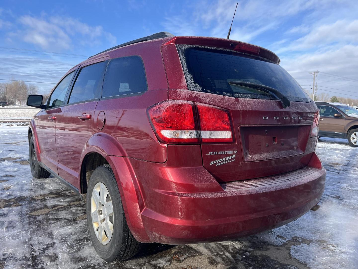 2011 Maroon Dodge Journey Express (3D4PG4FB5BT) with an 2.4L L4 DOHC 16V engine, 4-Speed Automatic transmission, located at 17255 hwy 65 NE, Ham Lake, MN, 55304, 0.000000, 0.000000 - Photo#2