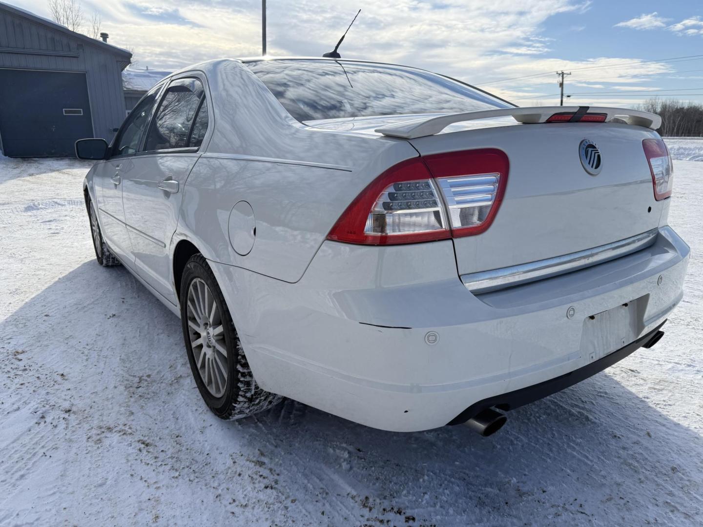 2009 White Mercury Milan V6 Premier (3MEHM08139R) with an 3.0L V6 DOHC 24V engine, 6-Speed Automatic transmission, located at 17255 hwy 65 NE, Ham Lake, MN, 55304, 0.000000, 0.000000 - Photo#2