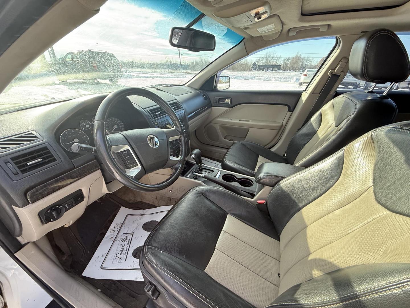 2009 White Mercury Milan V6 Premier (3MEHM08139R) with an 3.0L V6 DOHC 24V engine, 6-Speed Automatic transmission, located at 17255 hwy 65 NE, Ham Lake, MN, 55304, 0.000000, 0.000000 - Photo#9